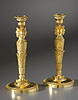 An extremely rare and superb quality pair of Empire gilt bronze candlesticks attributed to Claude Galle